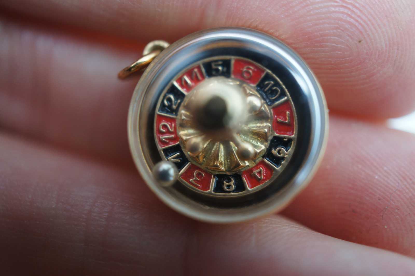 Louis Vuitton 18k Yellow Gold Roulette Game Wheel Charm Pendant For Sale at  1stDibs